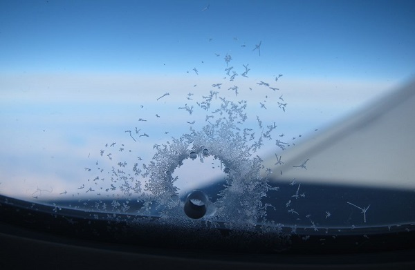 A tiny hole on an airplane window